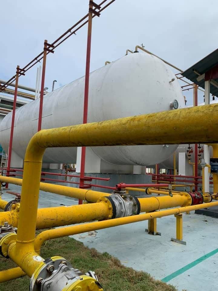 LPG bulk tank with yellow gas piping